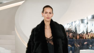 Slip lingerie dresses styled with heavy coats at Michael Kors. Photo: Michael Kors
