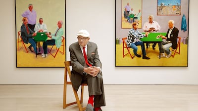Hockney with his work Card Players, left, and digital 'photographic drawing' A Bigger Card Players, at Annely Juda Fine Art in central London in 2015.
