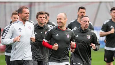 Arjen Robben, centre, takes part in training ahead of Bayern Munich's Uefa Champions League quarter-final second leg against Sevilla. Lukas Barth / EPA