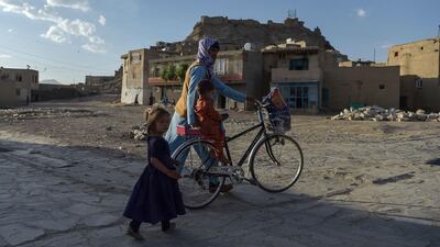 An family in the city of Ghazni, south-eastern Afghanistan. US Secretary of State Antony Blinken said new aid will 'provide life-saving protection, shelter, livelihoods, opportunities' for Afghans. AFP