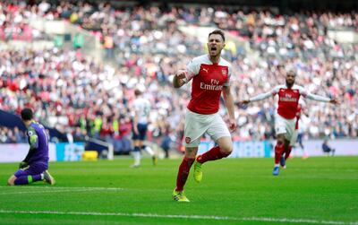 Arsenal's Aaron Ramsey celebrates scoring against Tottenham Hotspur at Wembley. Reuters