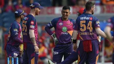 MS Dhoni, centre, could play a big part inf the Indian Premier League final for Rising Pune Supergiant. Indranil Mukherjee / AFP