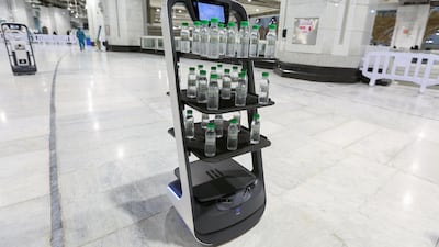 A smart robot used for the first time at the Grand Mosque in Saudi Arabia's holy city of Mecca, supplying worshippers with bottles of Zamzam water to reduce direct contact with staff as a measure to prevent Covid-19 infections spreading during the yearly Hajj pilgrimage.