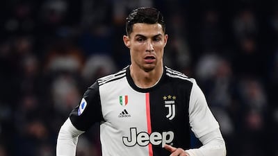 Cristiano Ronaldo runs with the ball. AFP