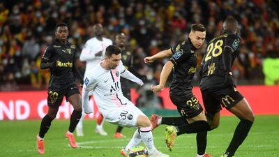Paris Saint-Germain's Argentinian forward Lionel Messi runs with the ball. AFP