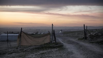A faint light can be seen in the distance in Al Poraa on February 2, 2018. The community is off the grid and so depends on solar power for electricity. Heidi Levine