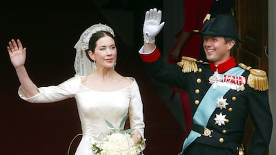 Crown Prince Frederik and his new wife Crown Princess Mary wave to the crowd following their wedding ceremony in Copenhagen in 2004. AP