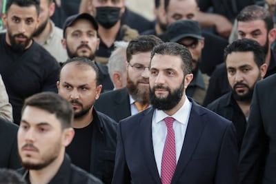 Syria's interim President Ahmad Al Shara attends a gathering in Aleppo on Tuesday. Reuters