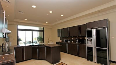 The kitchen, should the buyer wish to dine in rather than at one of the hotel's restaurants. Courtesy Fine and Country International