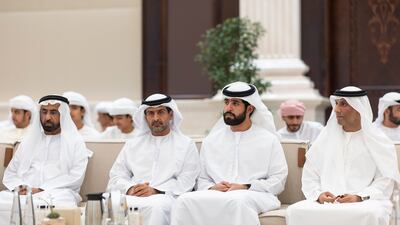 Sheikh Zayed bin Saif bin Mohamed and Sheikh Khalifa bin Saeed bin Mohamed follow proceedings. Photo: Ryan Carter / UAE Presidential Court