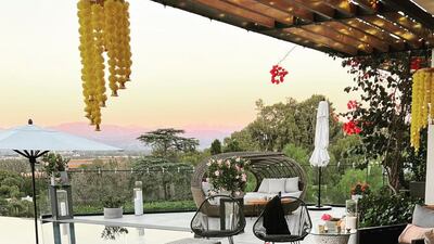 Traditional floral decorations adorn the Jonas home.