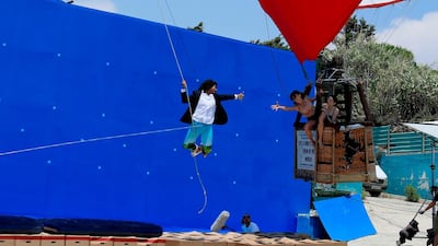 Cypriot actress and producer Marianna Rosset, right, rehearses a scene with Indian-British actor Diljohn Singh on the set of the movie 'SOS: Survive or Sacrifice'. AFP