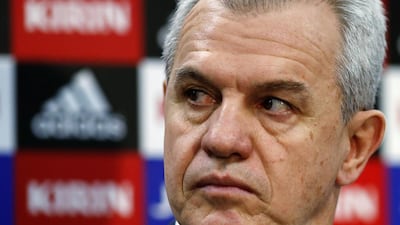 Japan's head coach Javier Aguirre will not have to keep looking over his shoulder for a hook. He will coach the Blue Samurai through their Asian Cup title defence. Thomas Peter / Reuters