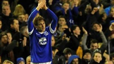 Everton's Nikica Jelavic acknowledges the fans as he leaves the field as the match-winner against Tottenham Hotspur.
