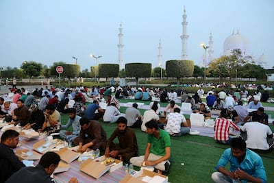 People breaking their fast on the first day of Ramadan 2019 at Sheikh Zayed Grand Mosque in Abu Dhabi. Pawan Singh / The National