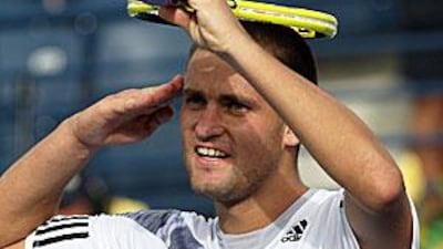 Youzhny salutes the crowd after his victory to ensure passage to the final.