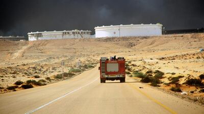 Smokes rises following a fire in an oil storage tank at the port of Ras Lanuf, Libya on January 23, 2016. Gen Khalifa Haftar seized the port on Sunday from guards loyal to a rival government. Reuters
