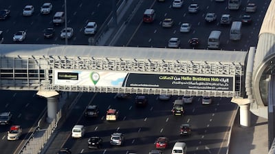 Traffic builds up in Downtown Dubai. Chris Whiteoak / The National