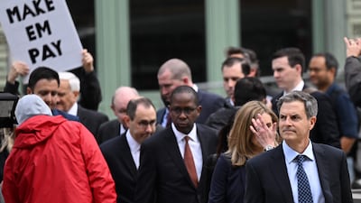 Lawyers for Fox News arrive at the court in Delaware. AFP