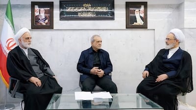 Iranian President Masoud Pezeshkian, Gholam-Hossein Mohseni-Eje'i, the head of the judiciary and Alireza Arafi, deputy chairman of the Assembly of Experts, attend the meeting of the interim leadership council of Iran in an unknown location, amid the U.S.-Israel conflict with Iran, in Iran, March 1, 2026. IRIB/WANA (West Asia News Agency)/Handout via REUTERS ATTENTION EDITORS - THIS PICTURE WAS PROVIDED BY A THIRD PARTY REFILE - ADDED CONTEXT