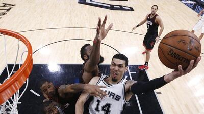 San Antonio Spurs guard Danny Green goes to the basket against the Houston Rockets. Larry W Smith / EPA