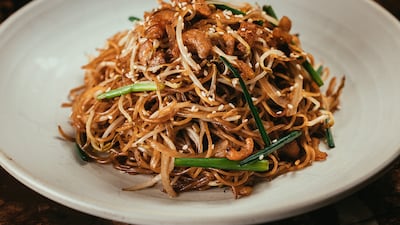 Stir-fried egg noodles with dried shrimp, eggs, soy sauce and spring onion