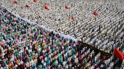 Moroccan Muslim women, left, and men, right, perform prayers for Eid Al Fitr which marks the end of the Muslim holy fasting month of Ramadan in the city of Sale, north of the Moroccan capital Rabat, on July 18, 2015. Fadel Senna / AFP photo