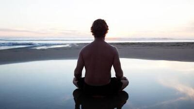 Meditation can help calm the mind and body. Russell Monk / Getty Images