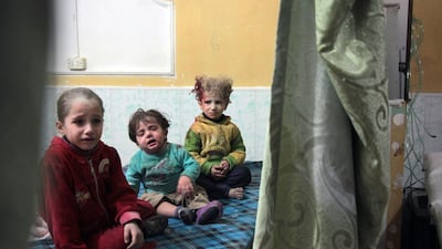 Many school children in the rebel-held town of Douma, in Syria's eastern Ghouta region, have fainted due to hunger, according to a UN World Food Programme report. AFP / Hamza Al Ajweh