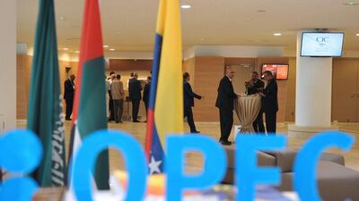 Above, participants attend the opening session of the International Energy Forum in Algiers. Ryad Kramdi / AFP