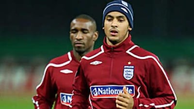Theo Walcott in training for England. He later became the eighth player to pull out of the England squad due to injury.
