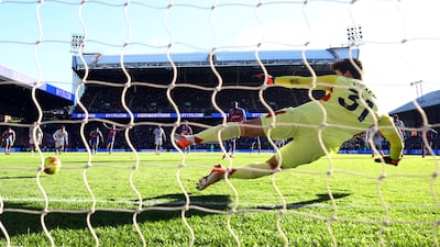 United goalkeeper Senne Lammens is sent to wrong way as Jean-Philippe Mateta scores Palace's first goal from the penalty spot. Reuters