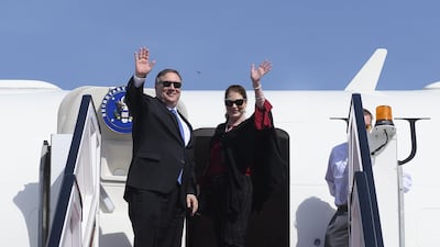 Mike Pompeo and his wife Susan depart from Abu Dhabi International Airport. AFP