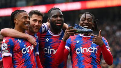 Eberechi Eze of Crystal Palace celebrates with teammates after scoring his side's third goal. Getty