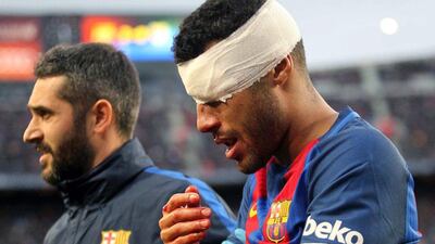 Barcelona midfielder Rafinha leaves the pitch after being injured during a Spanish Primera Liga match against Athletic Club at Camp Nou in Barcelona, northeastern Spain, 04 February 2017. Toni Albir / EPA
