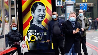 A government advertisement promoting the UK government's Covid-19 vaccine booster programme in London. Photo: AFP