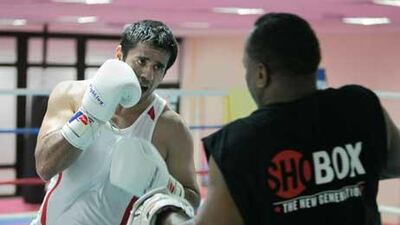UAE boxer Eisa al Dah training with his coach Anthony "Chill" Wilson.