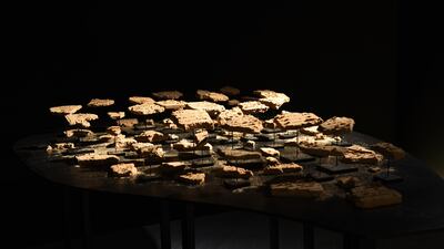 Detail of Nasser Alzayani’s installation 'Watering the distant, deserting the near', made of compressed sand tablets produced via a laser-cut stencilling method. Vidhyaa Chandramohan / The National