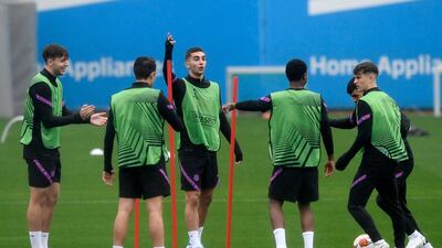 Barcelona's Ferran Torres, third left, at a training session with teammates. AFP