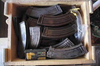 Russian Kalashnikov rifle stores in a gun store in downtown Idlib. The National