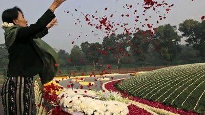 Myanmar's opposition leader Aung San Suu Kyi sends a floral tribute on the birth anniversary of India's first prime minister Jawaharlal Nehru at his memorial in New Delhi.