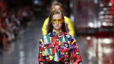 A model walks the runway at the fashion debut of the first co-ed Ferrari collection at Ferrari Factory on June 13, 2021 in Maranello, Italy. Getty Images