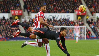 Manchester United Memphis Depay heads the ball under pressure from Glen Johnson, leading to Stoke’s first goal on Saturday. Darren Staples / Reuters