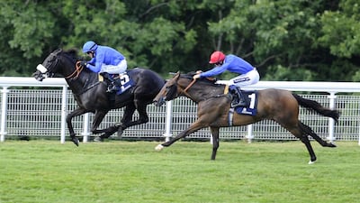 Cavalryman and Kieren Fallon, left, racing to victory in the Goodwood Cup ahead of Ahzeemah and Harry Bently, right, at Goodwood racecourse on July 31, 2014, in Chichester, England. Alan Crowhurst / Getty Images