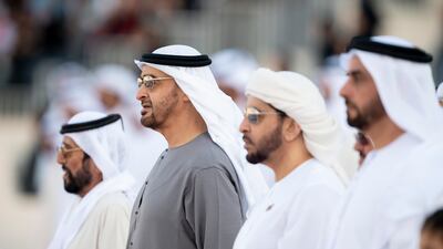 Sheikh Mohamed; Sheikh Tahnoon bin Mohamed, Ruler's Representative in Al Ain Region; Sheikh Hamdan bin Zayed, Ruler’s Representative in Al Dhafra Region; and Lt Gen Sheikh Saif bin Zayed, Deputy Prime Minister and Minister of Interior, stand for the national anthem. Hamad Al Kaabi / Presidential Court