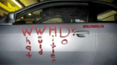 Daniel Cowart's car, which was being held by police in Alamo, Tenn, is covered with Nazi symbols and references to Hitler.