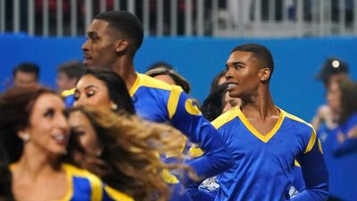 Rams cheerleaders Napoleon Jinnies, right, and Quinton Peron perform with other cheerleaders during Super Bowl LIII between the New England Patriots and the Los Angeles Rams at Mercedes-Benz Stadium in Atlanta, Georgia. AFP