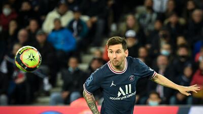 Paris Saint-Germain's Argentinian forward Lionel Messi watches the ball. AFP