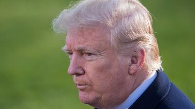 US President Donald J. Trump speaks to the news media before departing on Marine One with his family on the South Lawn of the White House in Washington, DC. EPA