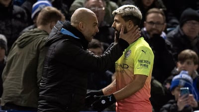 Manchester City manager Pep Guardiola, left, and goalscorer Sergio Aguero during the FA Cup fifth-round tie at Sheffield Wednesday. EPA